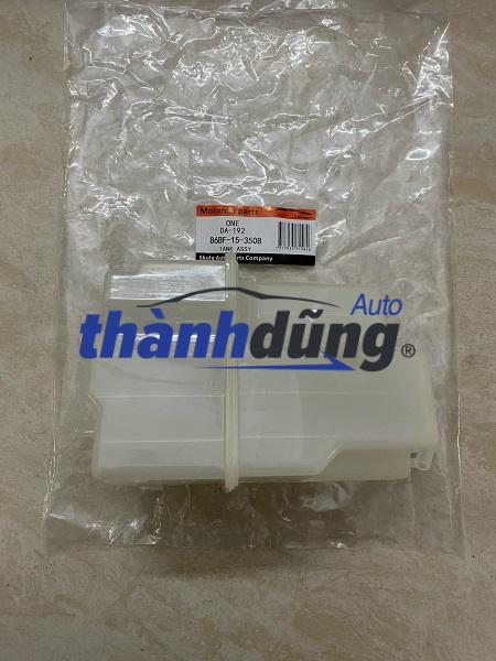 BÌNH NƯỚC PHỤ FORD LASER 2001