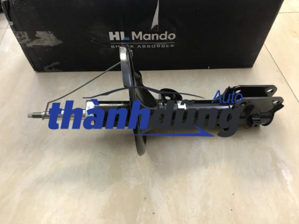 phuộc nhún trước xe kia carnival 2008