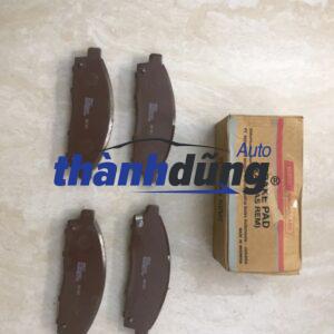bố thắng trước xe mitsubishi pajero 2009