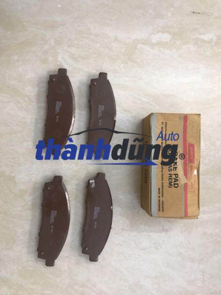 bố thắng trước xe mitsubishi pajero 2009